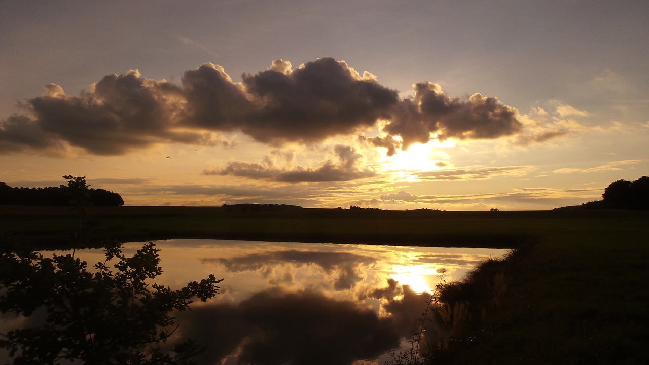 sunset clouds pond free photo