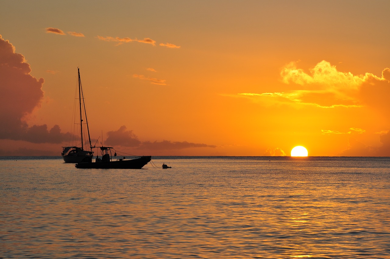 sunset body of water sea free photo