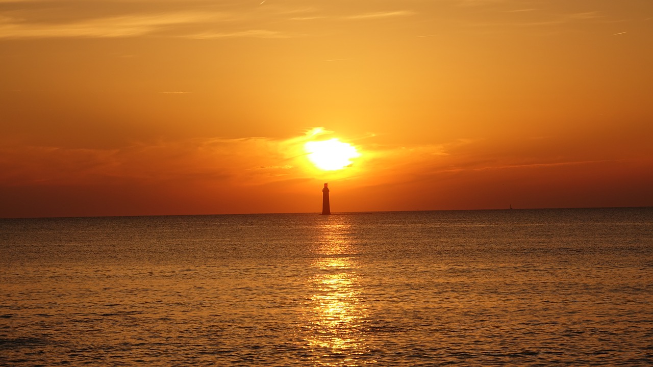 sunset lighthouse atlantic ocean free photo