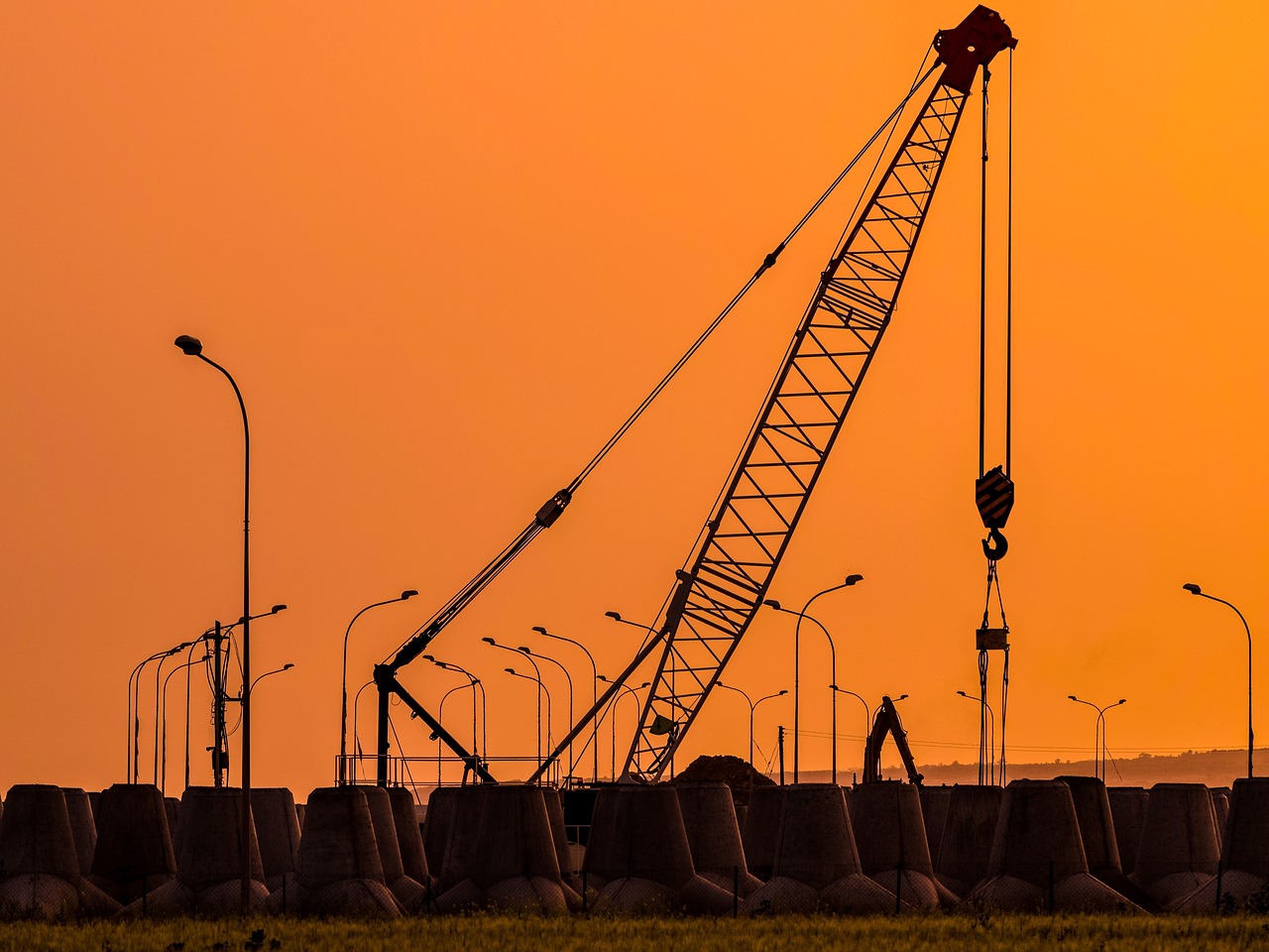 sunset crane pylons free photo