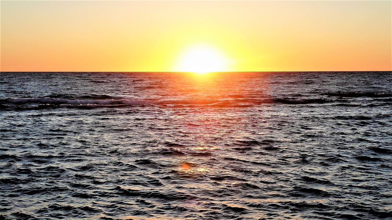 sunset  sea  waters free photo