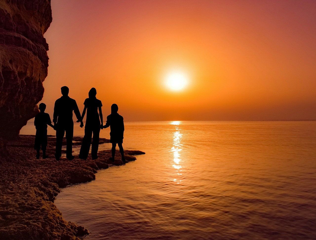 sunset  family  sea free photo