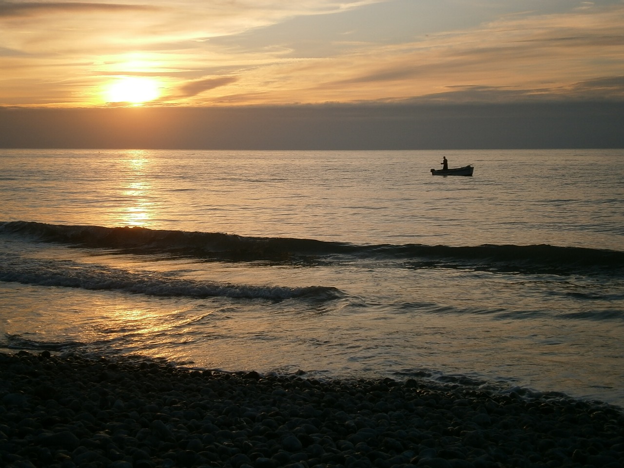 sunset  boat  little boat free photo