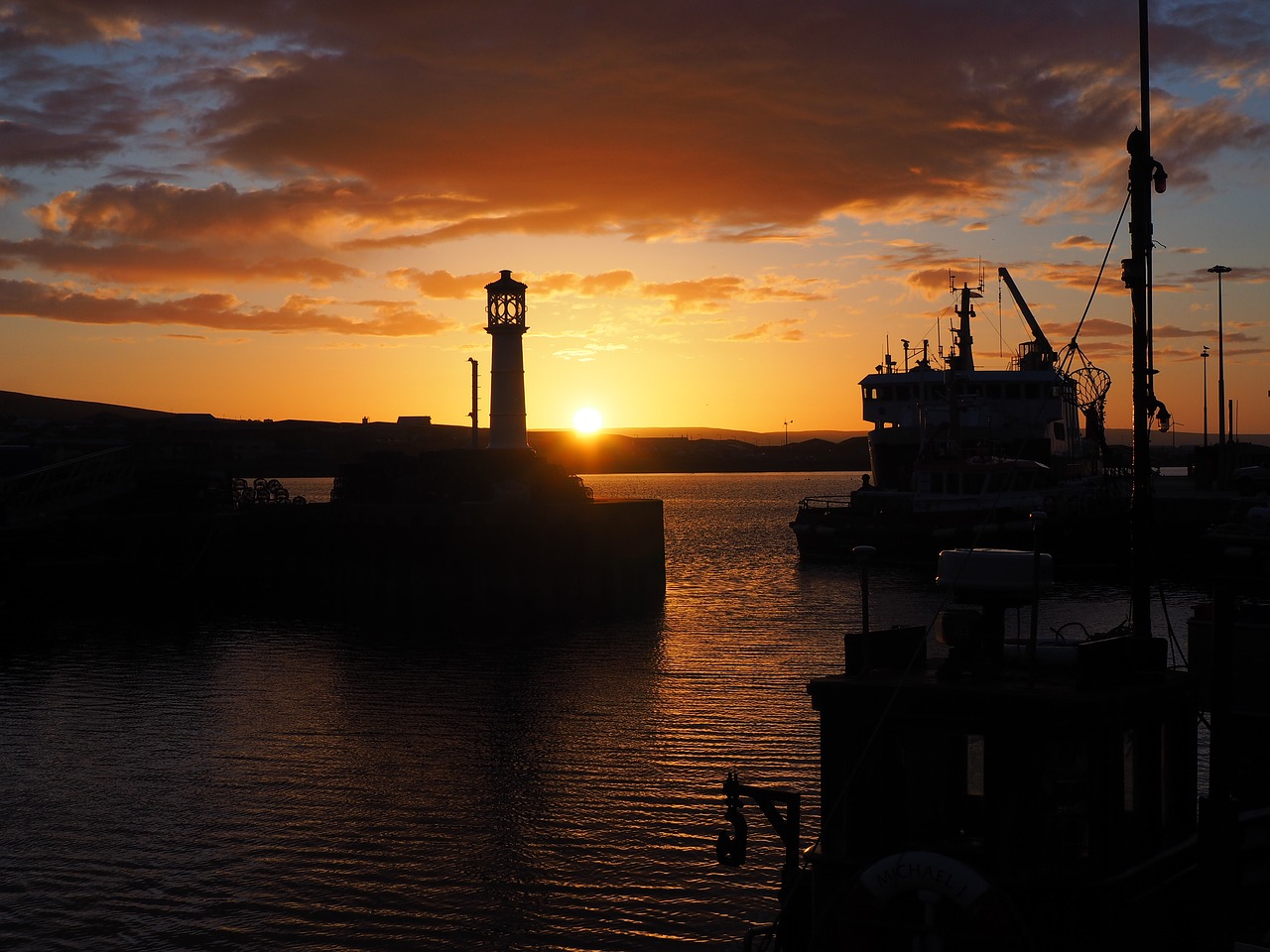 sunset  lighthouse  port free photo