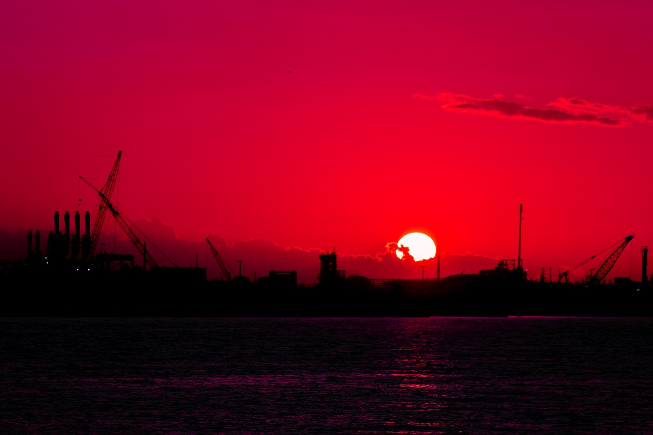 sunset  coastline  industrial free photo