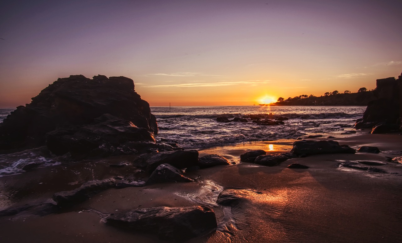 sunset  beach  sun sky free photo