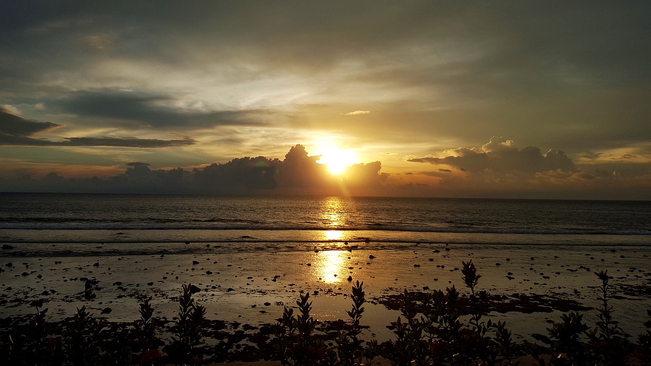 sunset  beach  clouds free photo