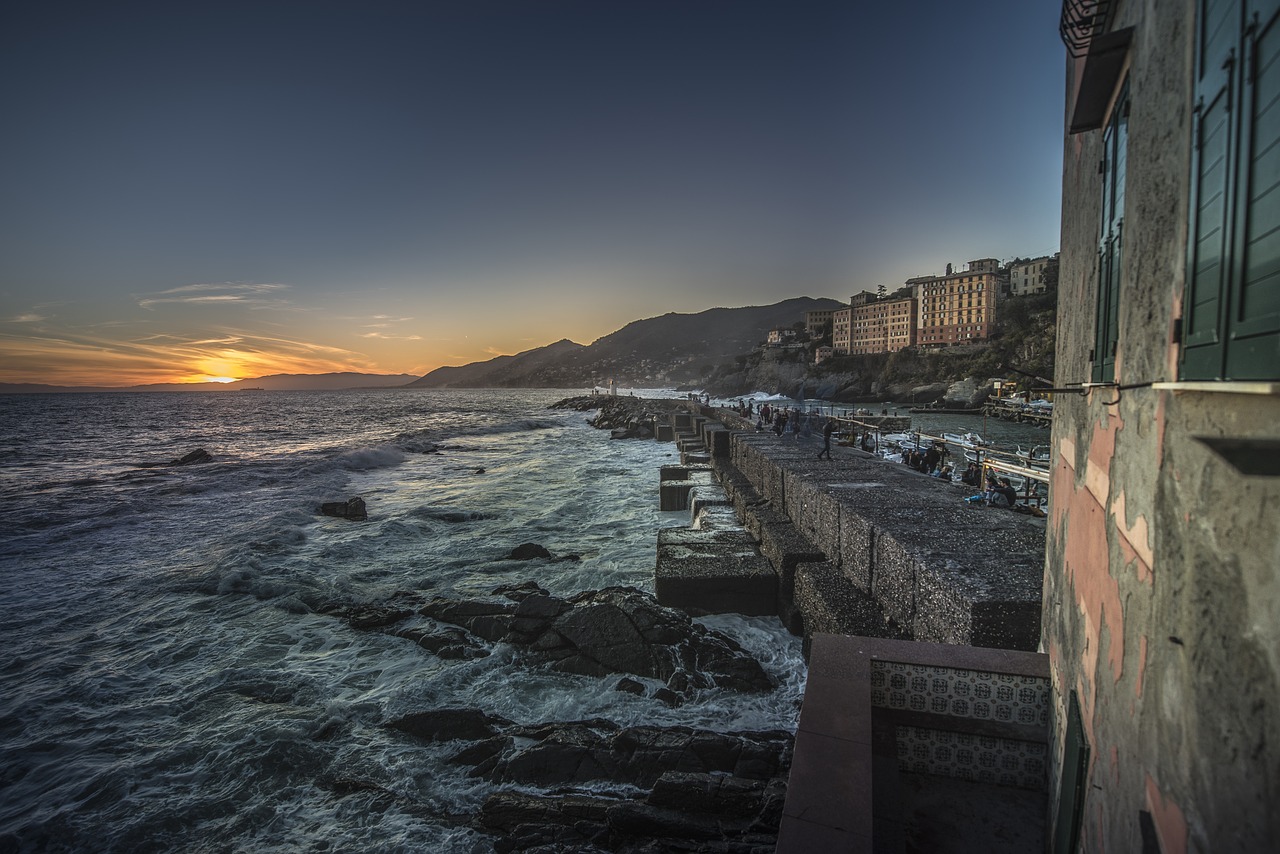 sunset  lighthouse  sea free photo