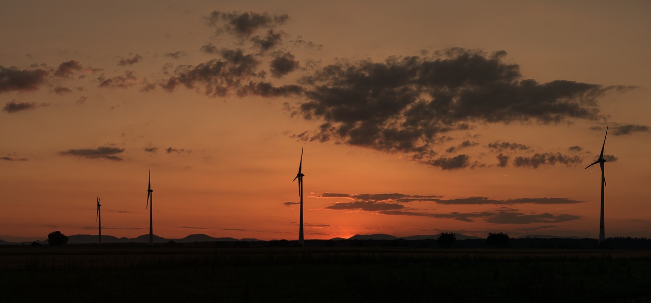 sunset  windräder  wind power free photo