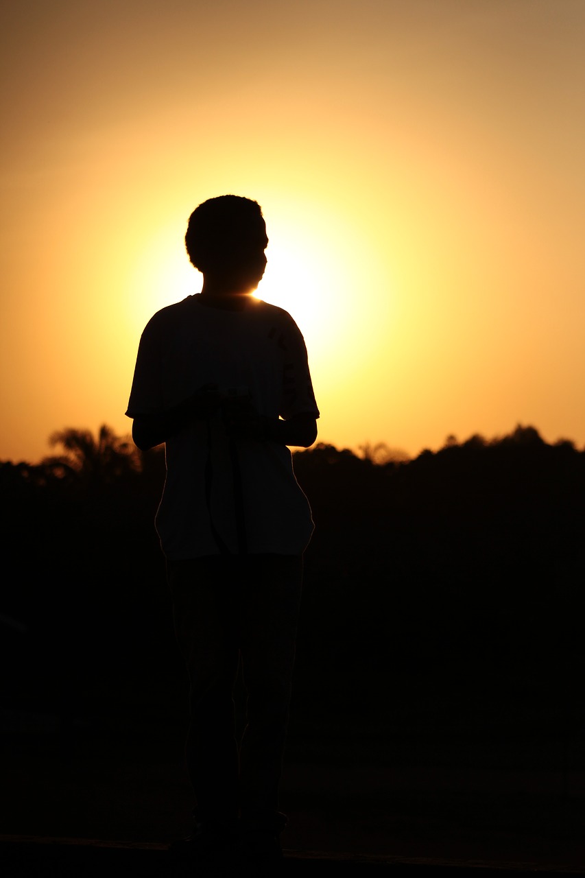 sunset  silhouette  man free photo