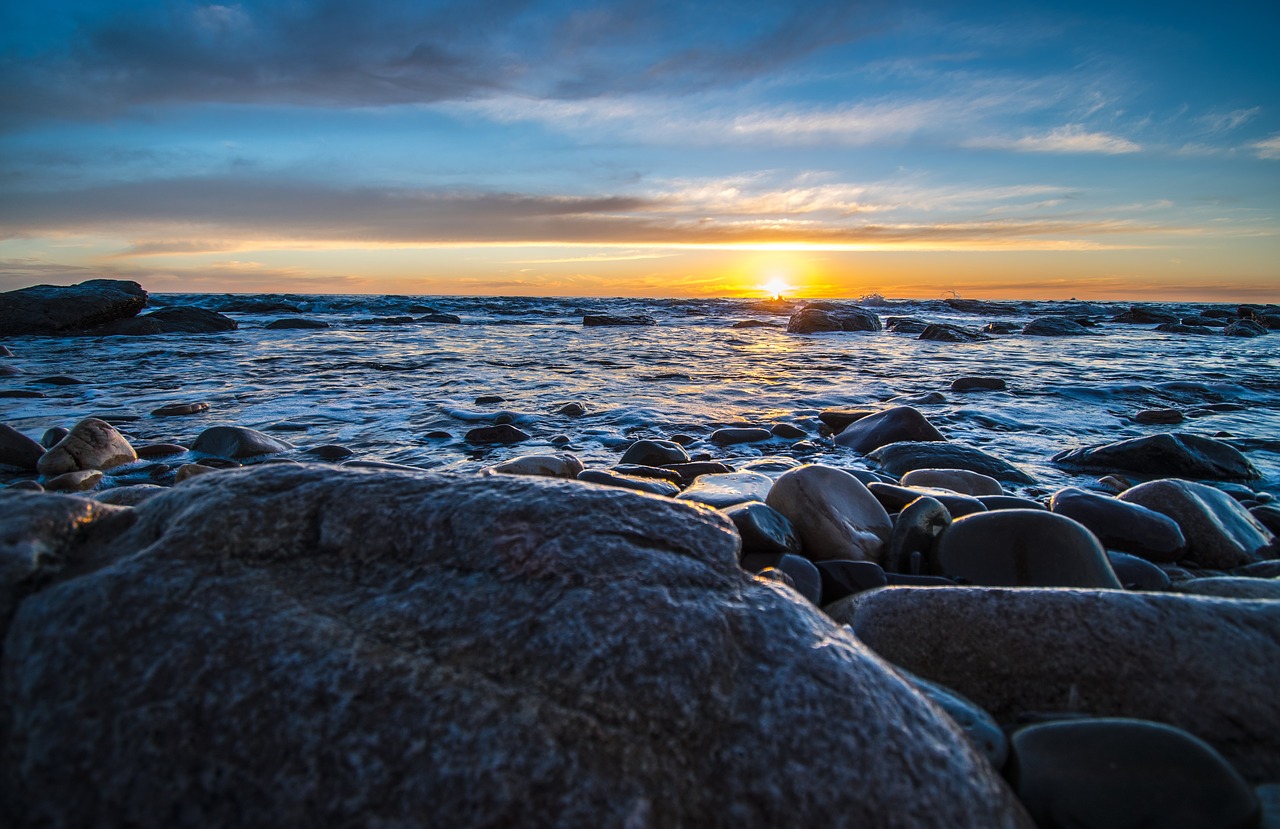 sunset  rocks  beach free photo