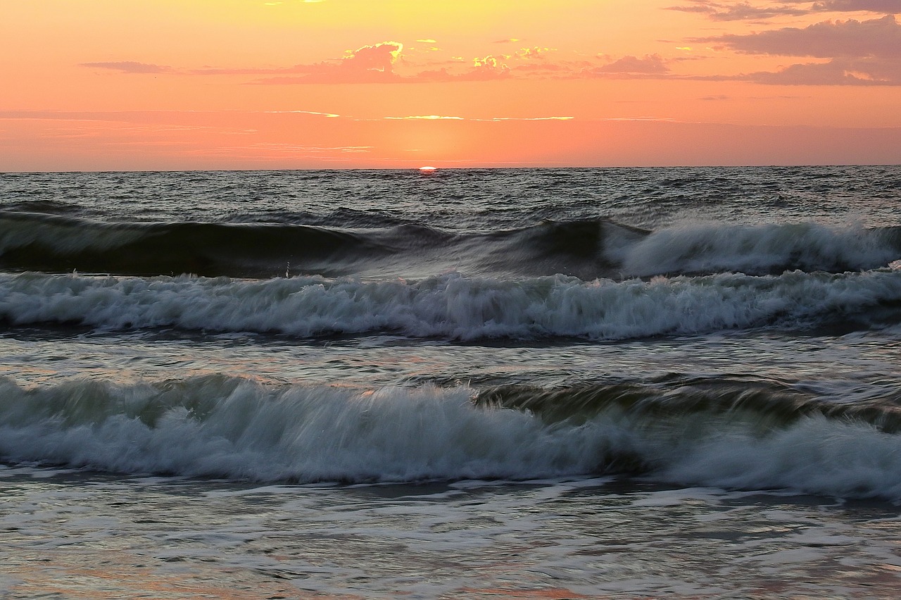 sunset  sea  the waves free photo