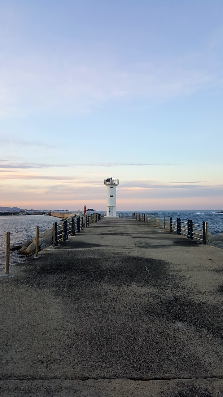 sunset  lighthouse  sky free photo