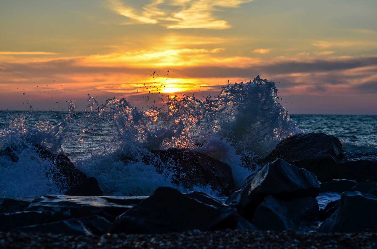 sunset  wave  spray free photo