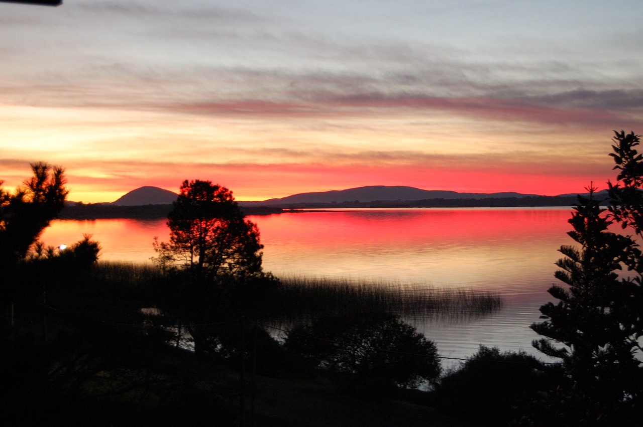 sunset  laguna  uruguay free photo