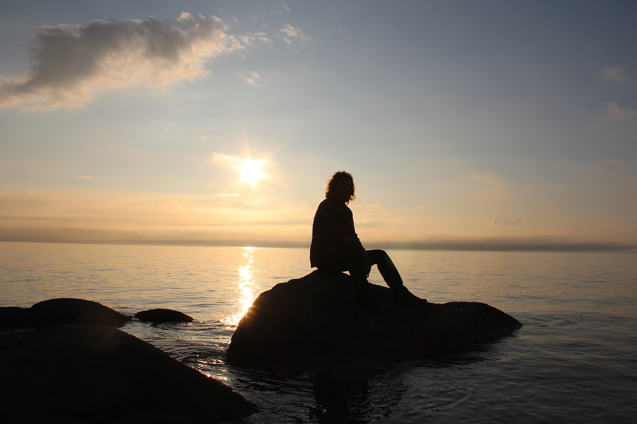 sunset  man  ocean free photo