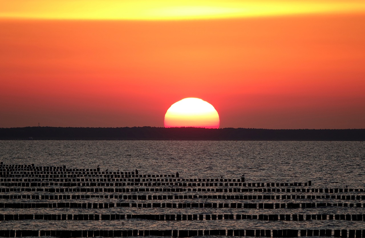 sunset  baltic sea  beach free photo