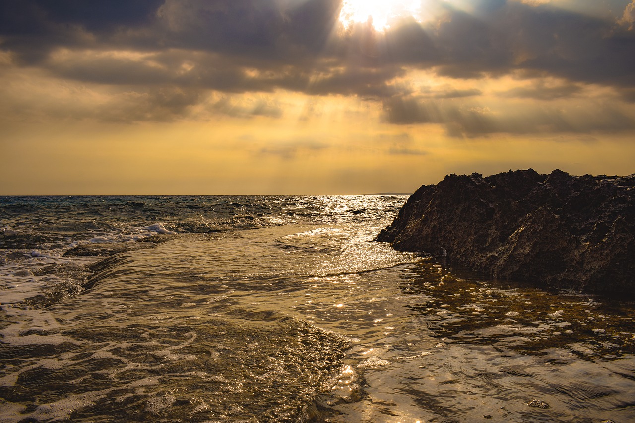 sunset  rock  sea free photo