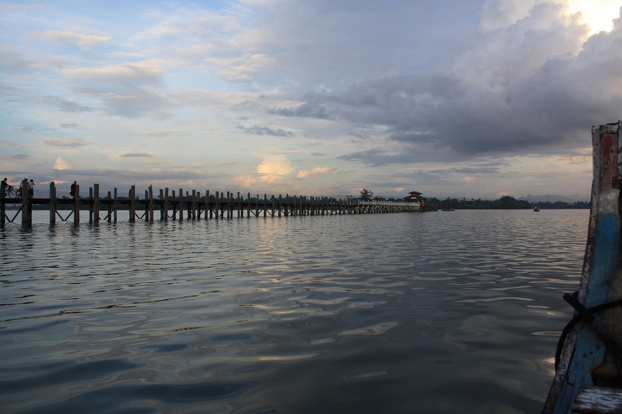 sunset  water  boat free photo