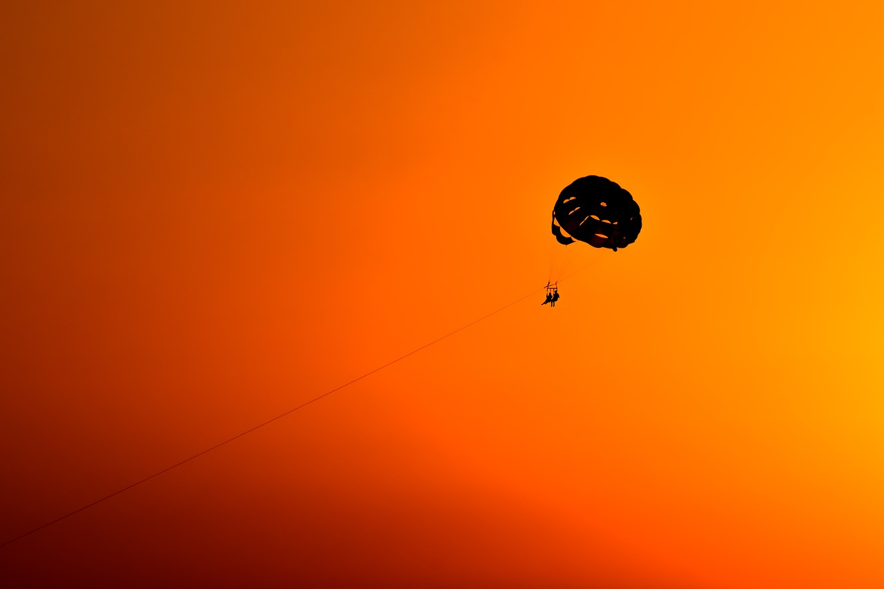 sunset  parachute  sky free photo