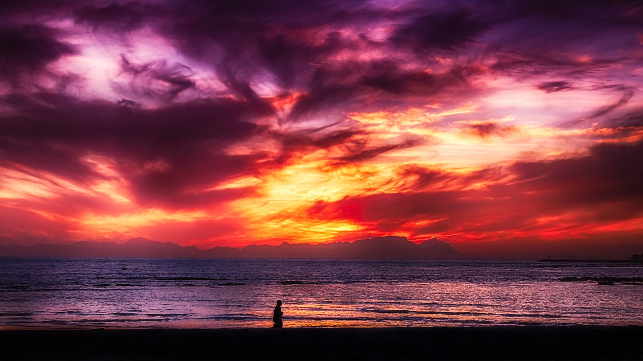 sunset  beach  clouds free photo