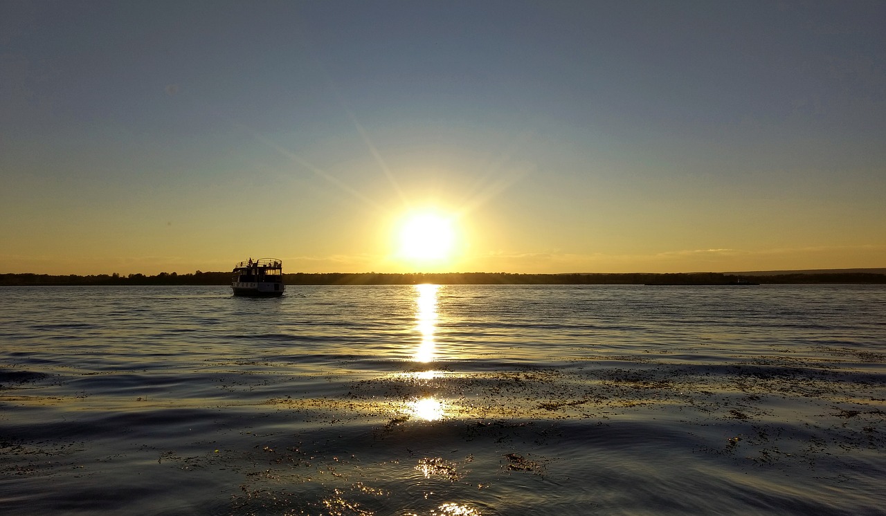 sunset  river  ship free photo