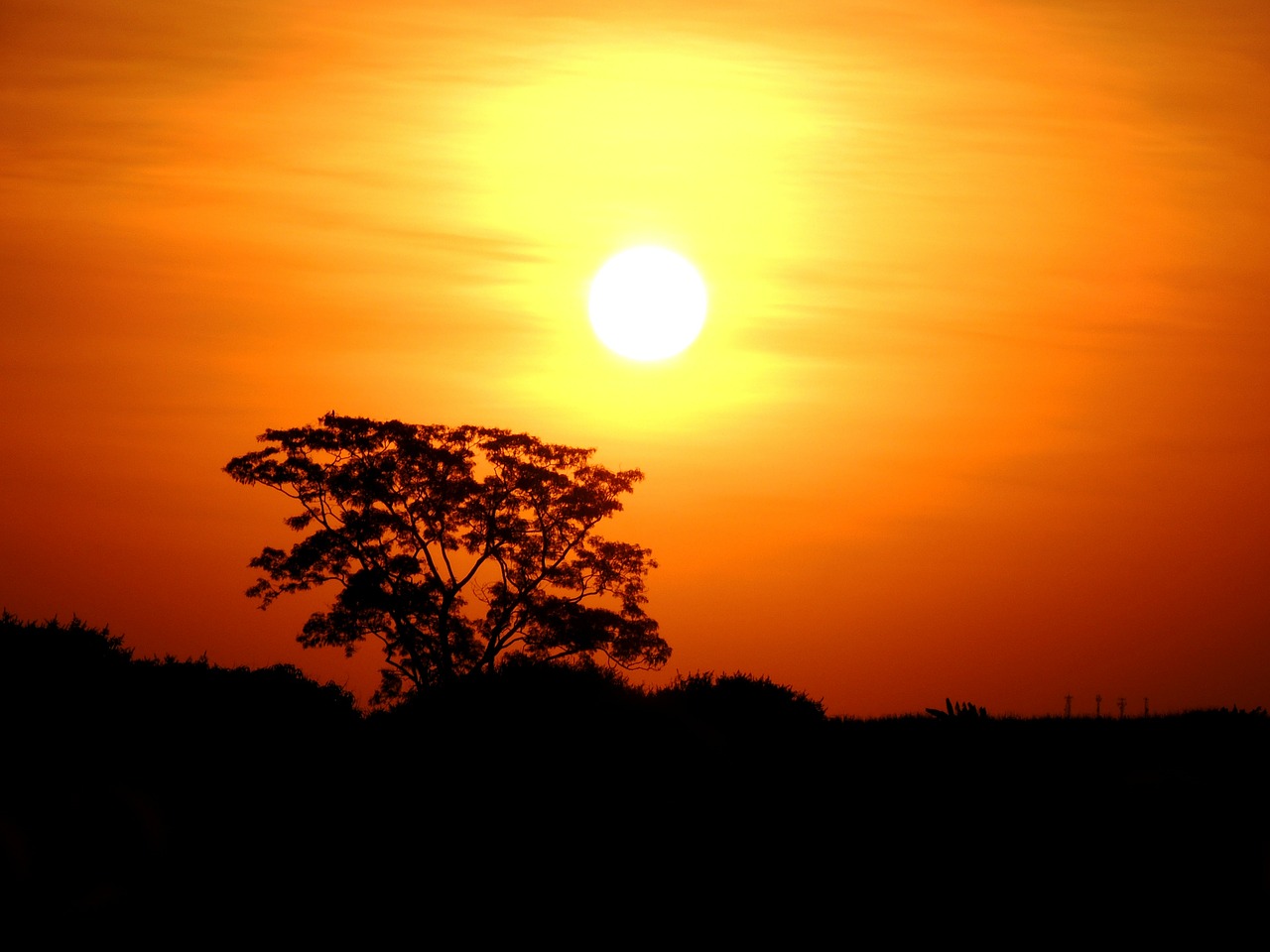 sunset against light clouds in the sun free photo