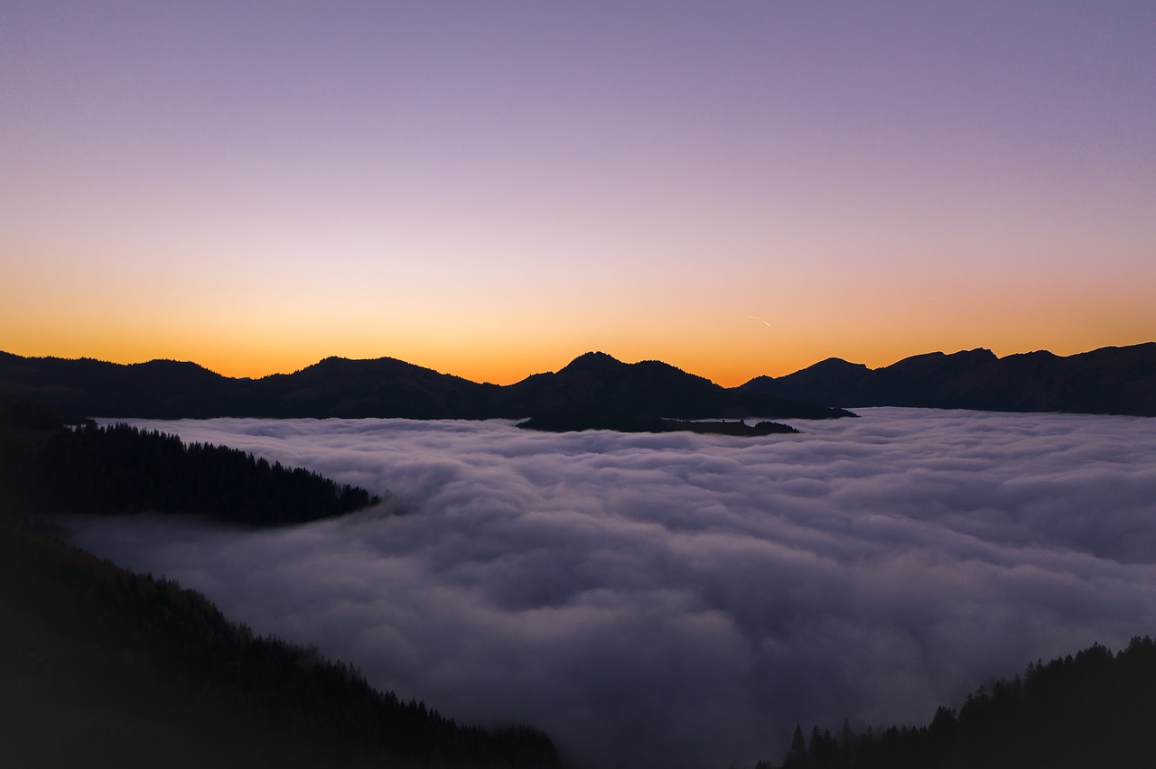 sunset  mountains  fog free photo