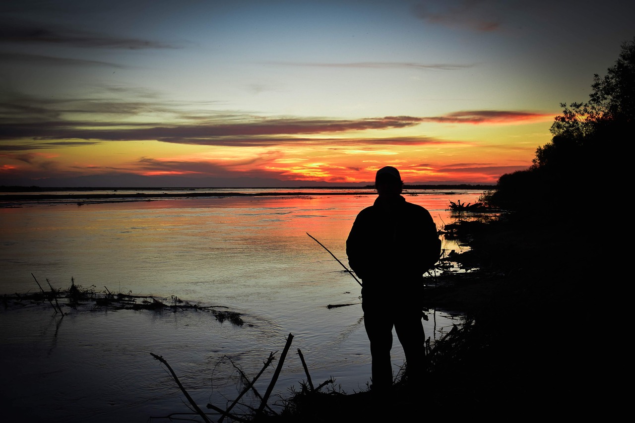 sunset  silhouette  river free photo