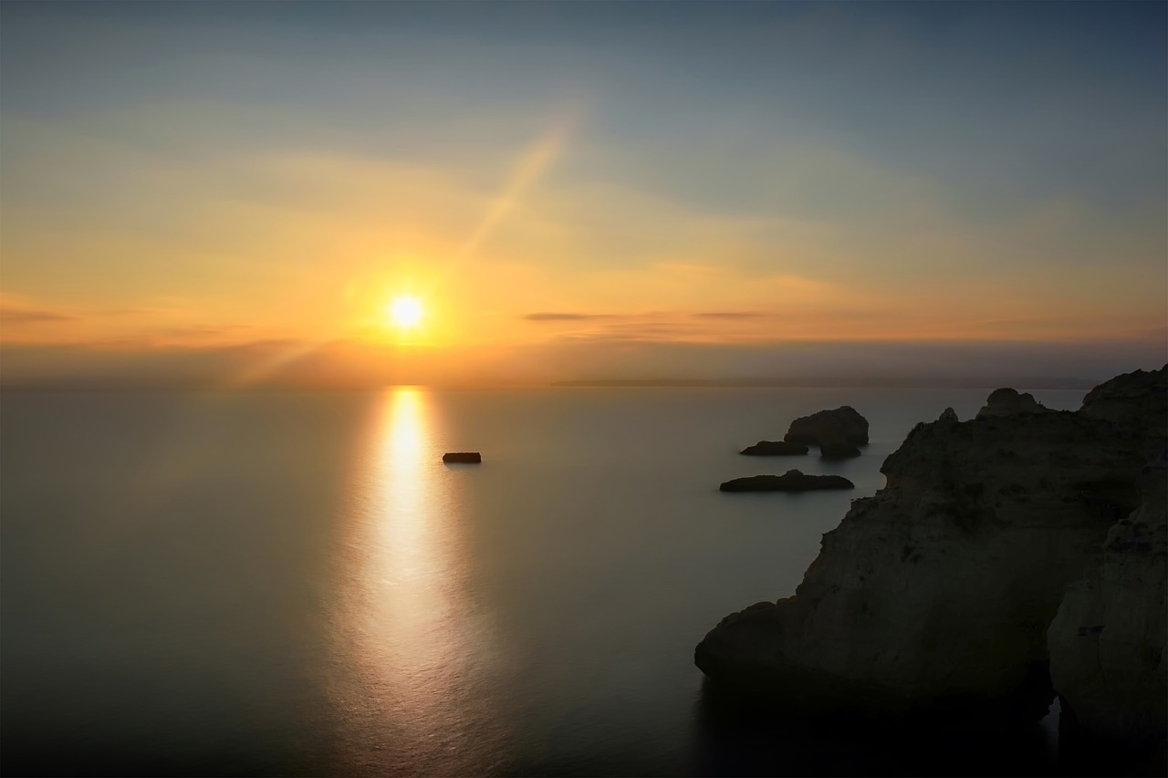 sunset  coastline  cliffs free photo