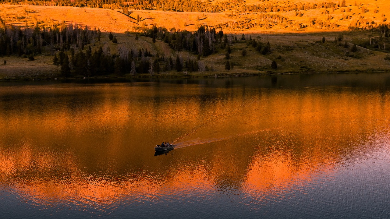 sunset  lake  boat free photo