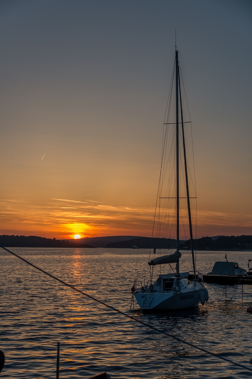 sunset boat ocean free photo