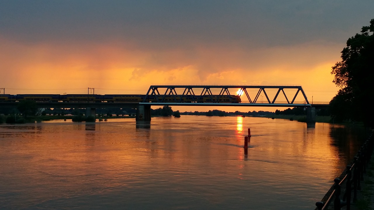 sunset  river  bridge free photo