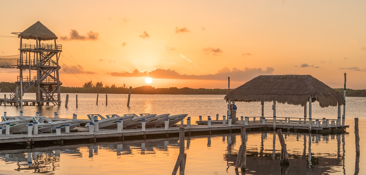 sunset  boats  sea free photo