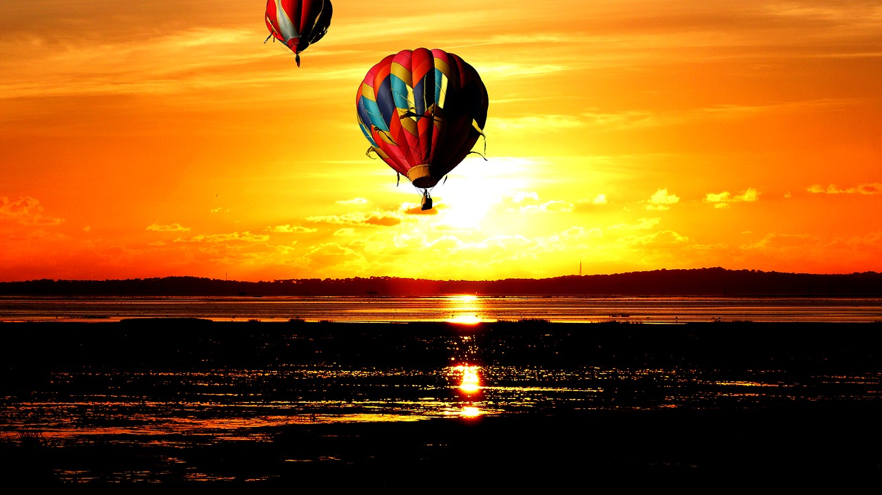 sunset  balloons  sky free photo