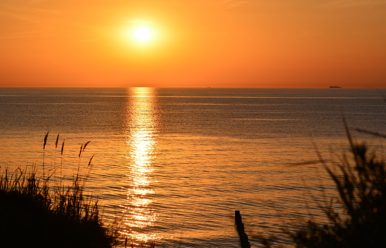 sunset  baltic sea  water free photo