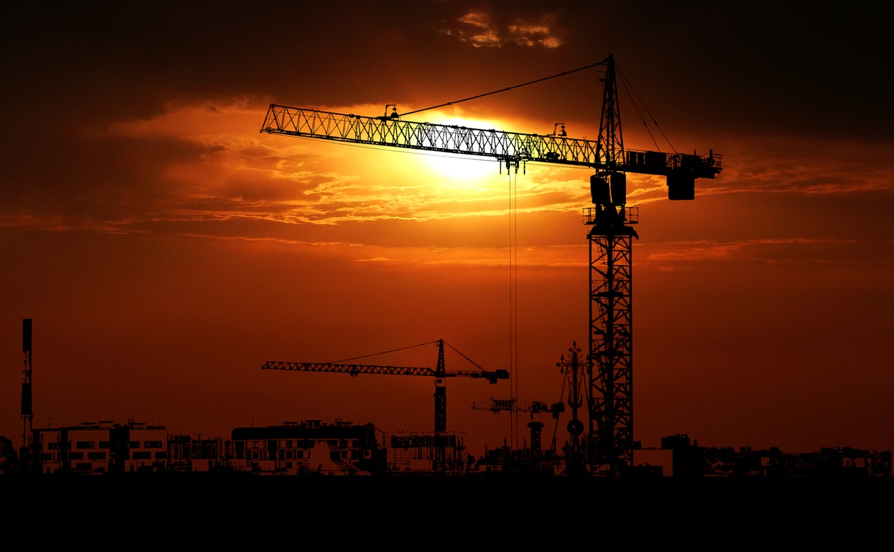 sunset  urban landscape  crane free photo