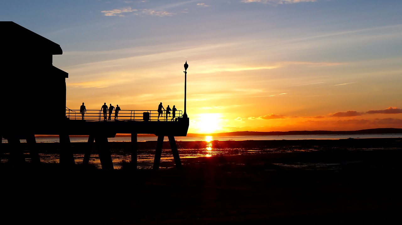 sunset  ocean  wharf free photo