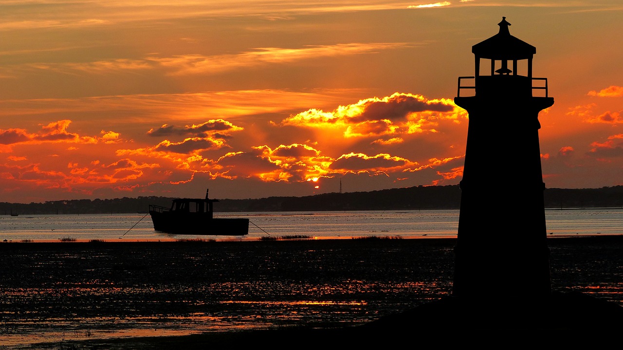 sunset  ocean  lighthouse free photo