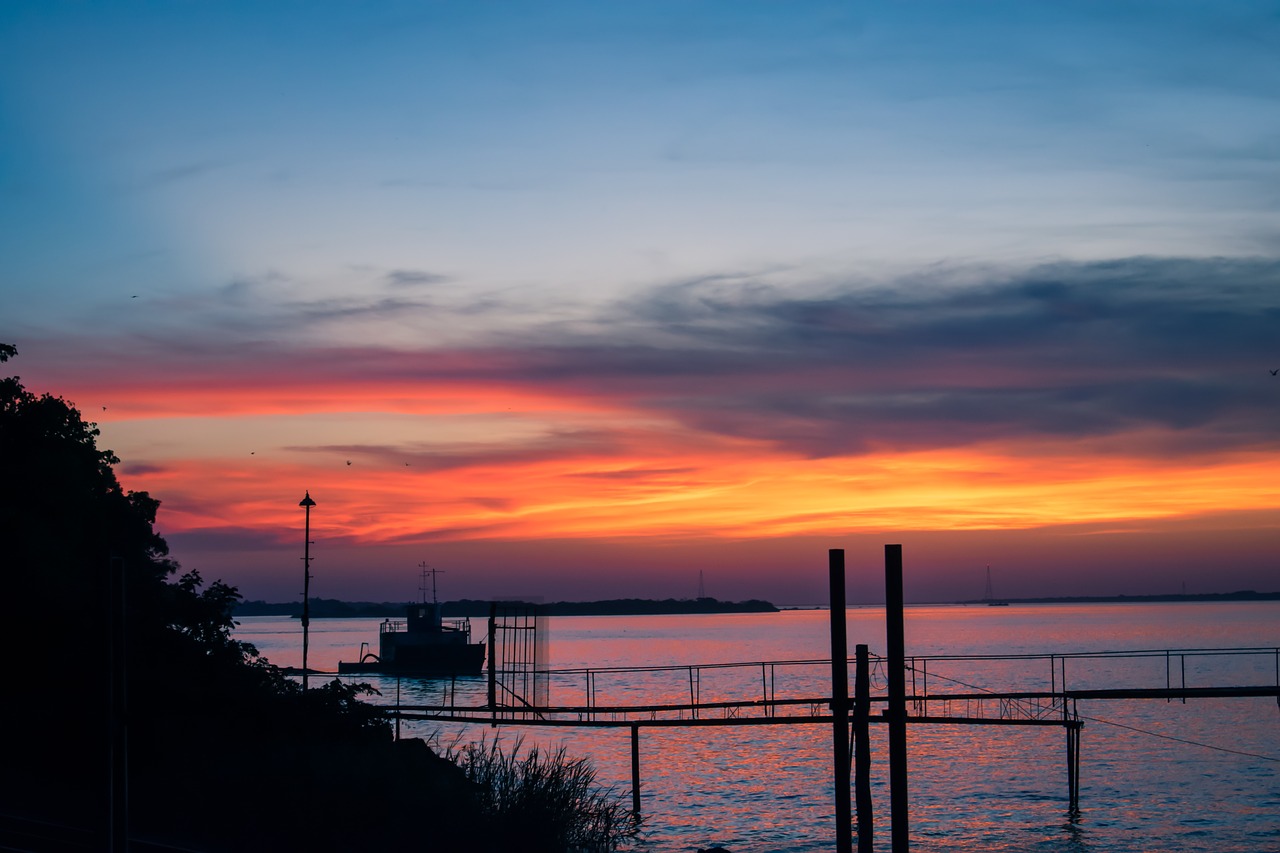 sunset  river  boats free photo