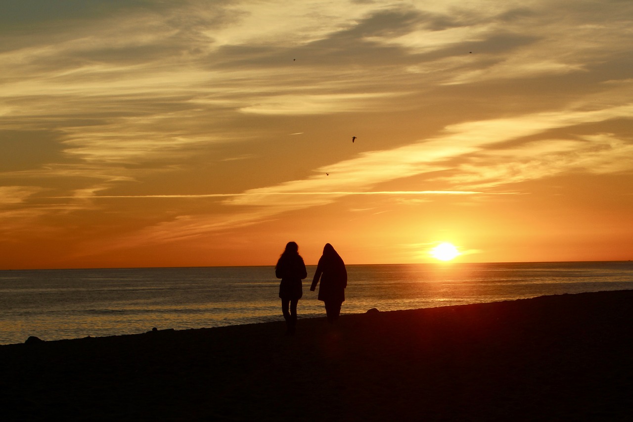 sunset  romantic  couple free photo