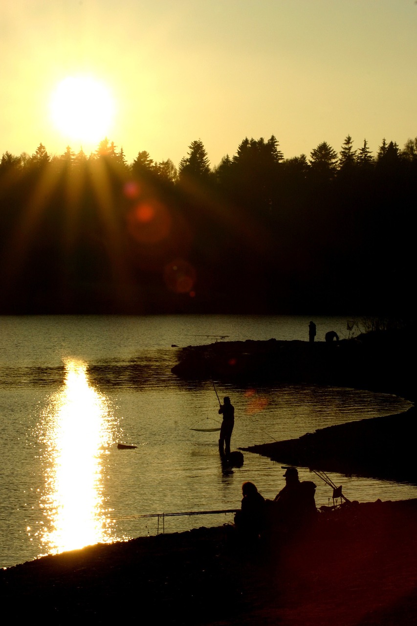 sunset fisherman dam free photo