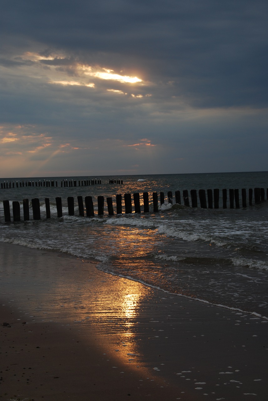 sunset the baltic sea the coast free photo