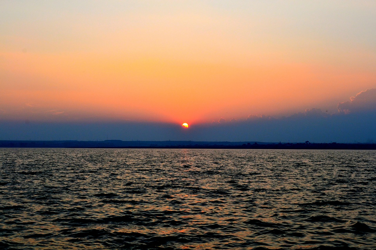 sunset sunlight lake free photo
