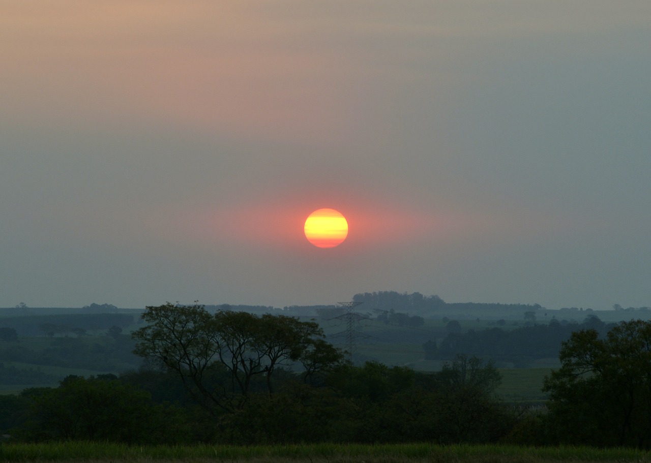 sunset against light clouds free photo