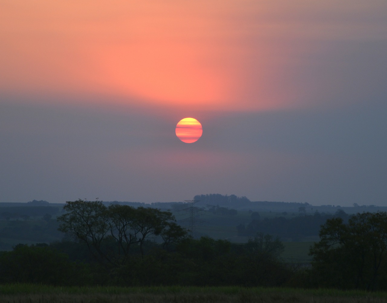 sunset against light clouds in the sun free photo