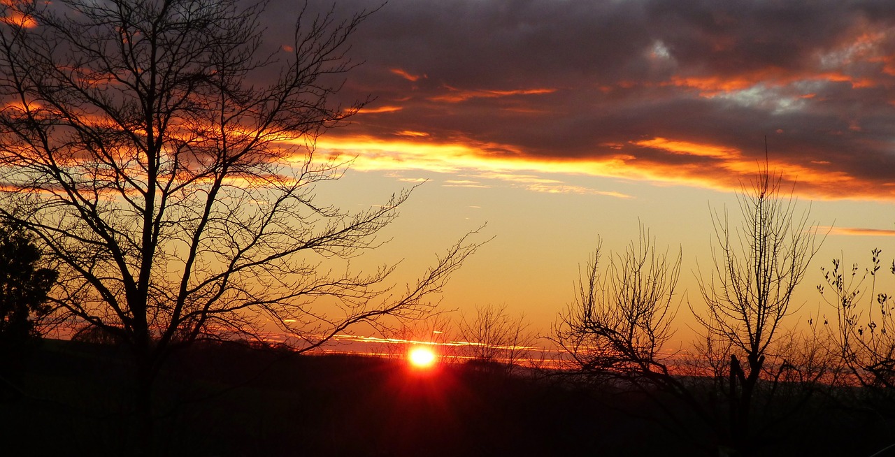 sunset setting sun colorful sunset free photo