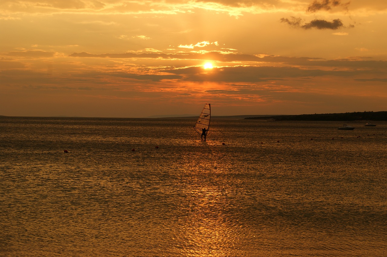 sunset surfer sea free photo