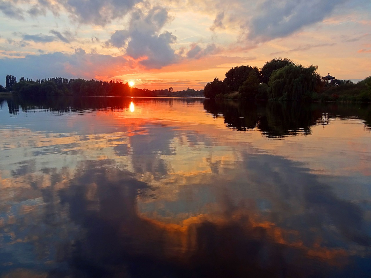 sunset lake water reflection free photo