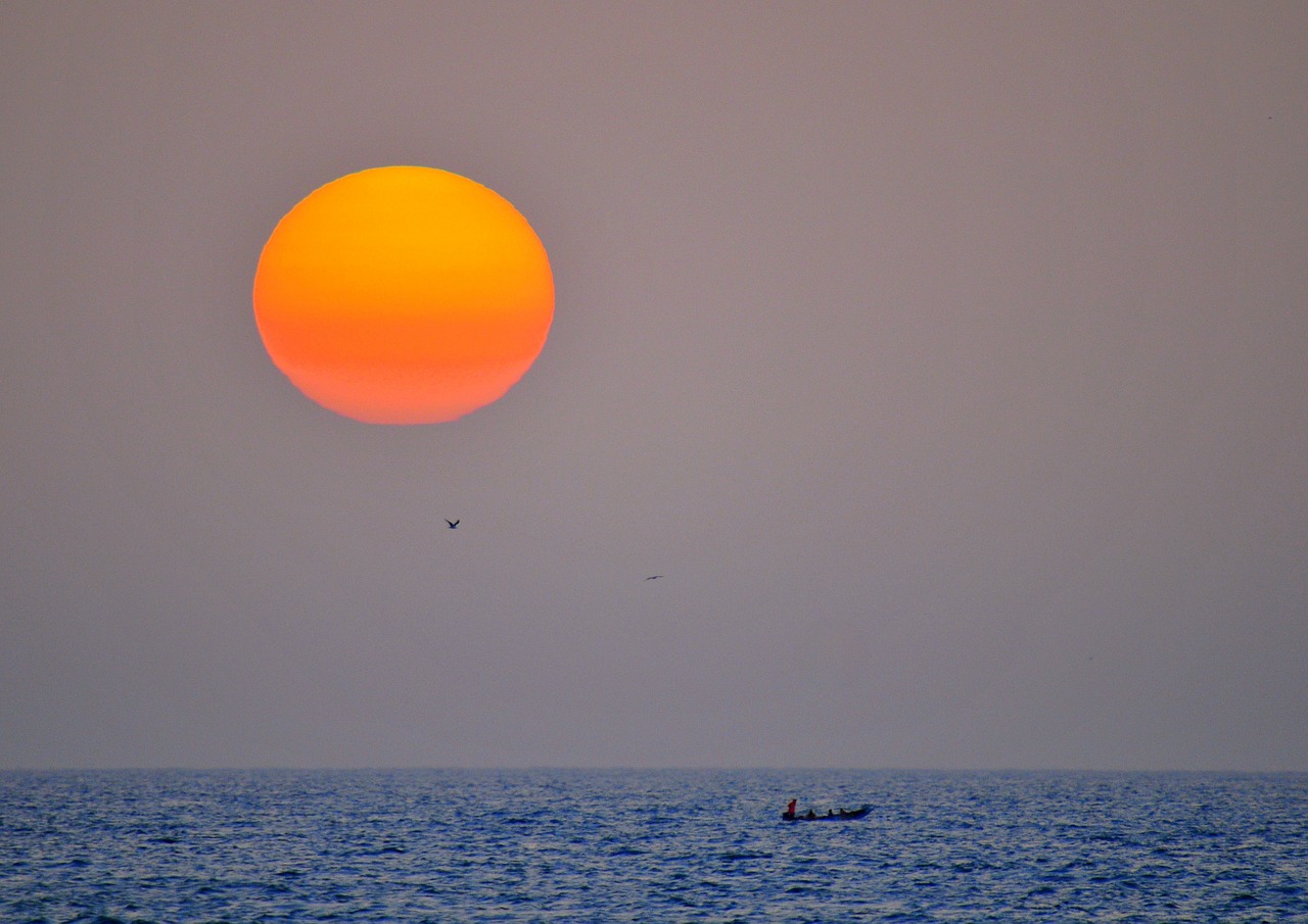sunset fishermen sea free photo